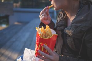 A person with Type 1 Diabetes making a smart choice about what to eat at McDonald's.