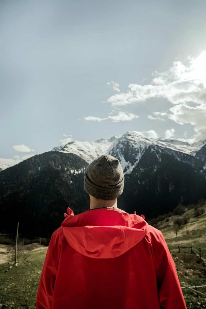 A person with Type 1 Diabetes hiking a mountain, showing it's possible to live a normal life.