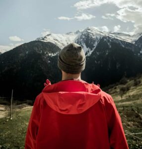 A person with Type 1 Diabetes hiking a mountain, showing it's possible to live a normal life.